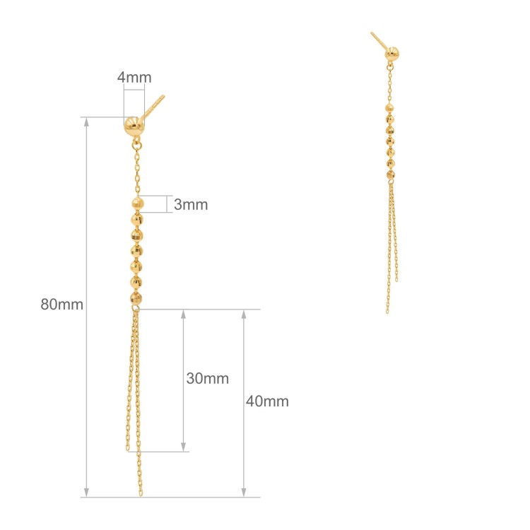 Złote kolczyki wiszące z kuleczkami i podwójnym łańcuszkiem na jasnym tle wymiary