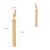 Złote kolczyki wiszące z długim łańcuszkowym chwostem na jasnym tle wymiary