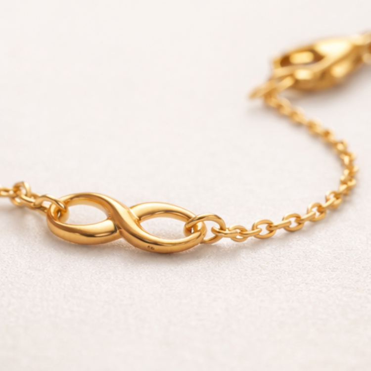 zlota-bransoletka-znak-nieskonczonosci-zblizenie.png