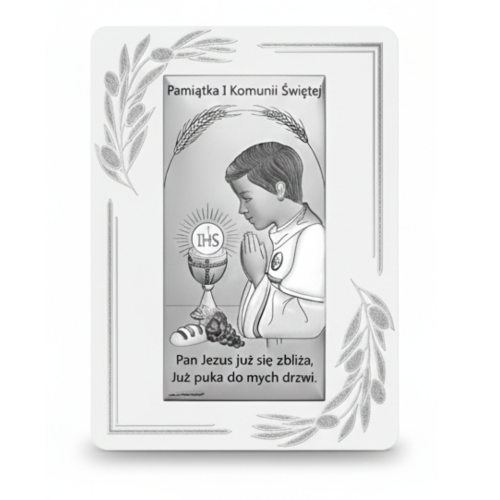 Srebrny obrazek komunijny z modlącym się chłopcem i hostią IHS, dekor gałązki, napis Pamiątka I Komunii Świętej