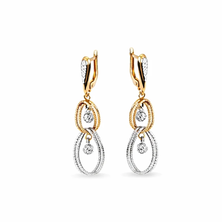 Dwukolorowe kolczyki wiszące z owalnymi zawieszkami na jasnym tle