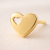 Złoty kolczyk serce z wyciętym serduszkiem