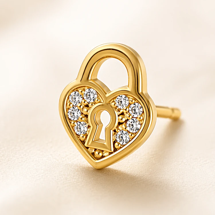 Złoty kolczyk kłódka z cyrkoniami