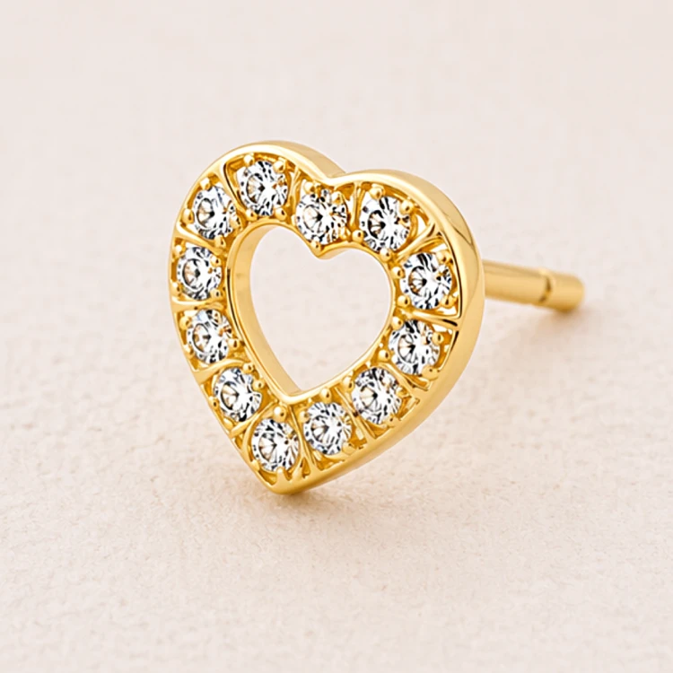 Złoty kolczyk serce z cyrkoniami i pustym środkiem
