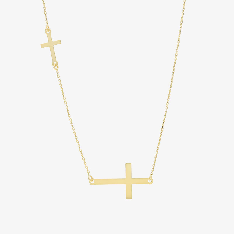 Złoty naszyjnik z podwójnym krzyżykiem – symbolika i elegancja